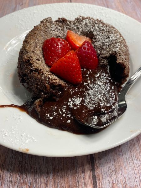 chocolate lava cake with strawberries on top