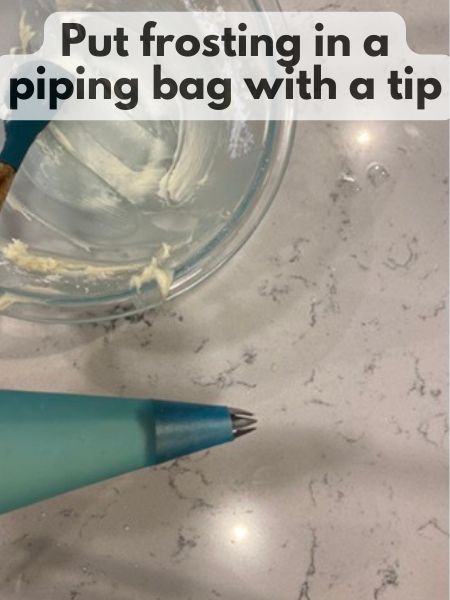 put frosting in piping bag with a star tip