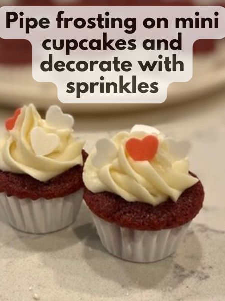 pipe frosting onto mini cupcakes and add Valentine's Day Sprinkles