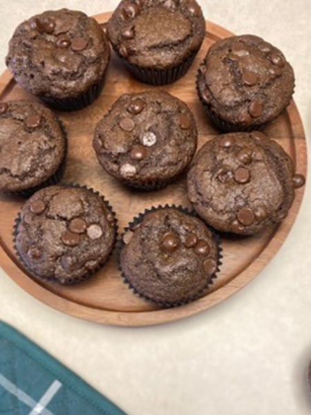 double chocolate muffins sitting on a plate