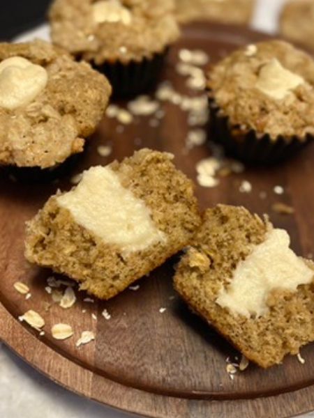 oatmeal cream pie muffin cut in half showing its ream filling