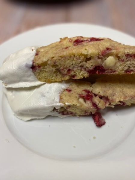 raspberry white chocolate biscotti on a plate