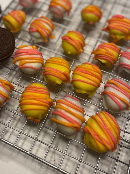 Oreo balls shaped and decorated like Easter eggs