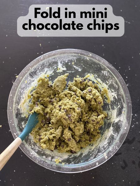 chocolate chips folded into matcha biscotti batter