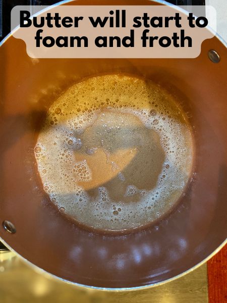 melted butter foaming in pan