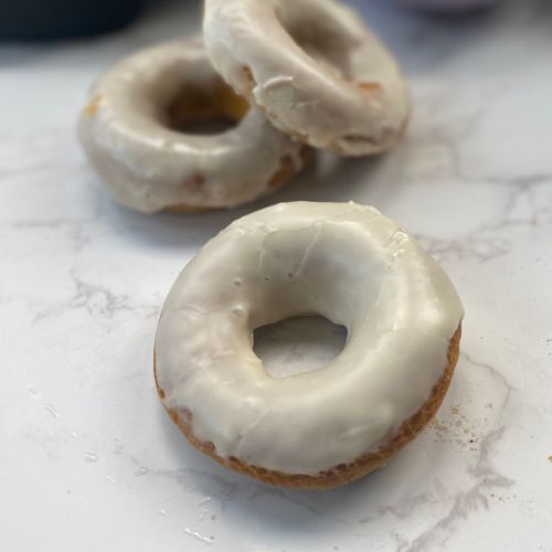 baked pumpkin donuts with maple glaze