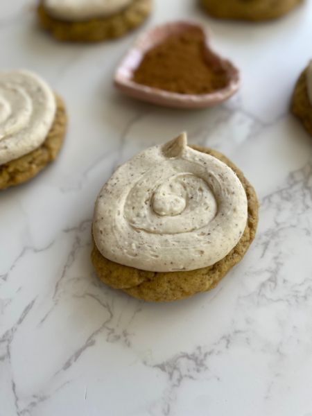 pumpkin sugar cookies with browned butter maple frosting