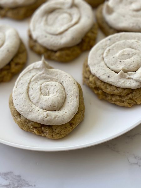 pumpkin sugar cookies with browned butter maple frosting