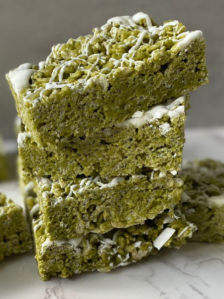 a stack of matcha rice krispie treats
