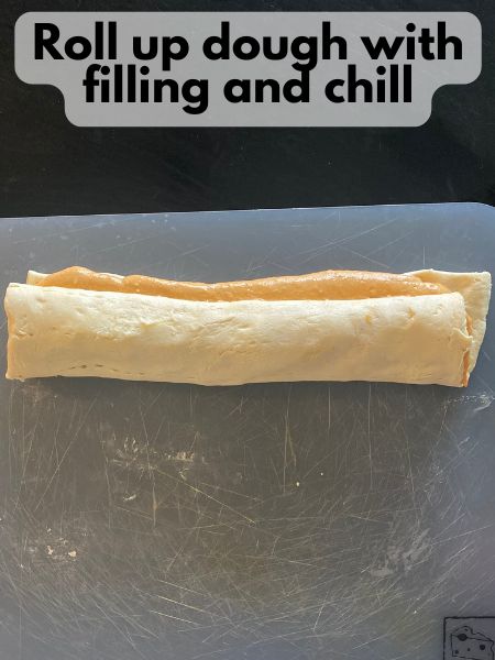 pumpkin cream cheese pinwheel rolled into a log