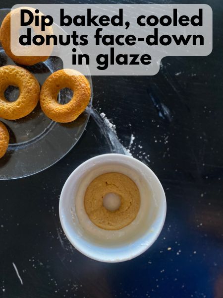 pumpkin donut face down in maple glaze