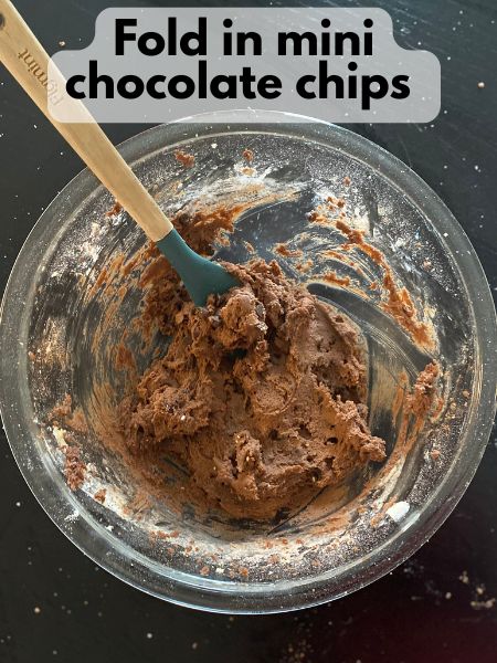 chocolate chips folded into to double chocolate cookie dough