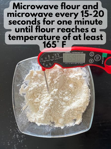 heat treated flour in a bowl with a thermometer