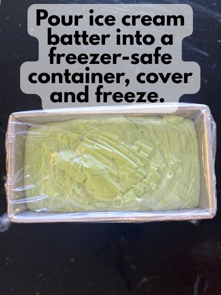 matcha lavender ice cream in a loaf pan covered tightly with plastic wrap