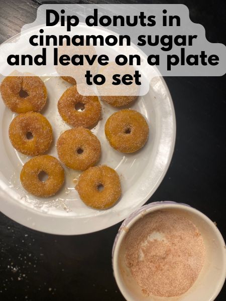 mini pumpkin donuts dipped in cinnamon sugar