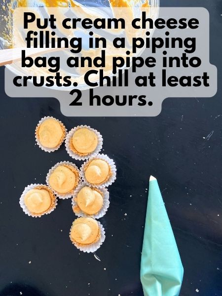 pumpkin cheesecake filling piped into crusts
