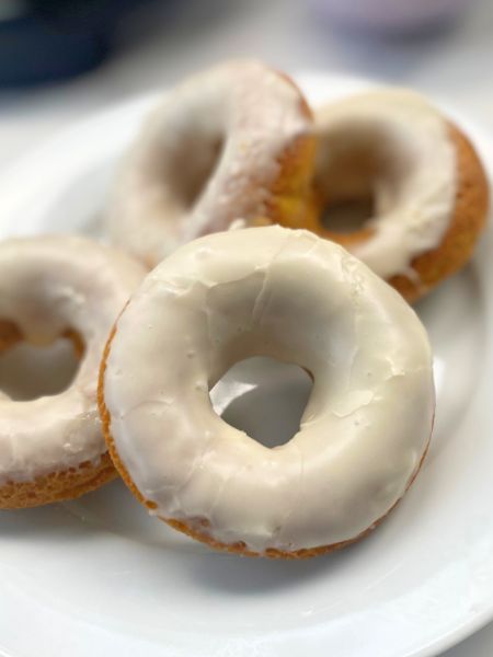 baked pumpkin donuts with maple glaze