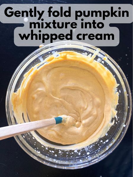 whipped cream folded into condensed milk and pumpkin mixture