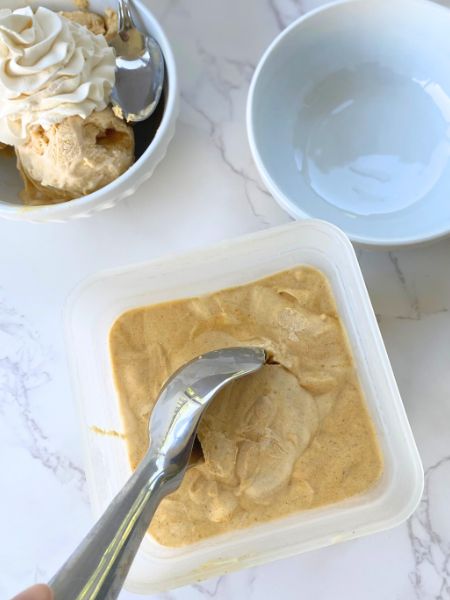 scooping pumpkin ice cream