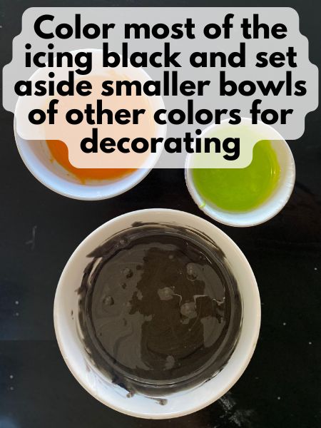colored royal icing in bowls