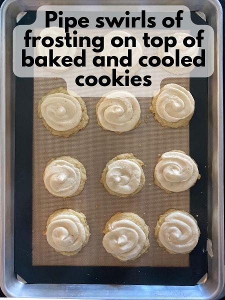 baked cookies with buttercream frosting