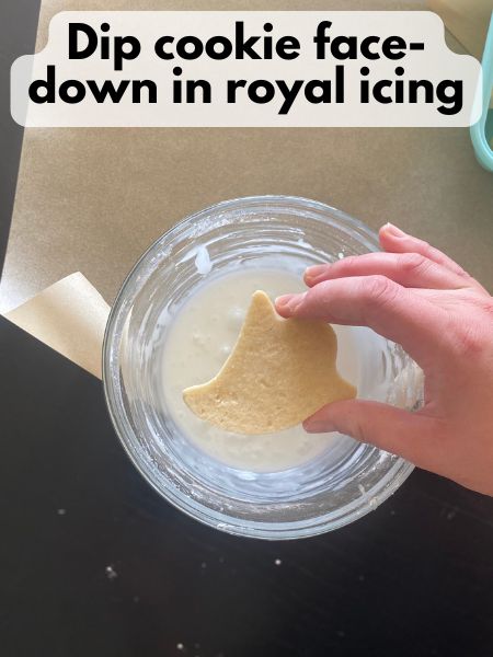 Halloween ghost sugar cookie dipped in royal icing