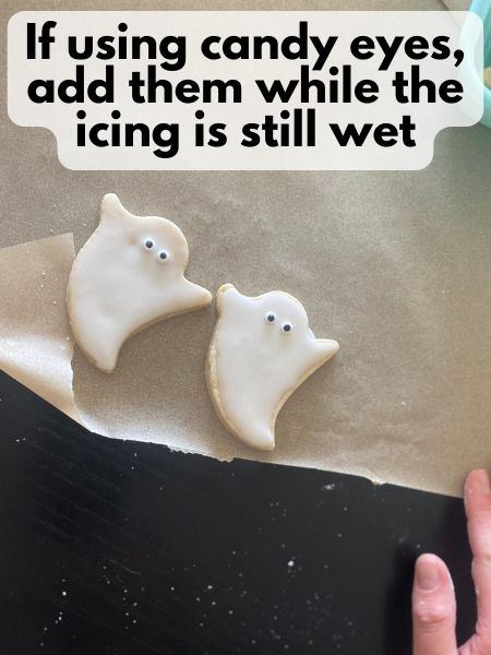 eyes added to Halloween ghost sugar cookies