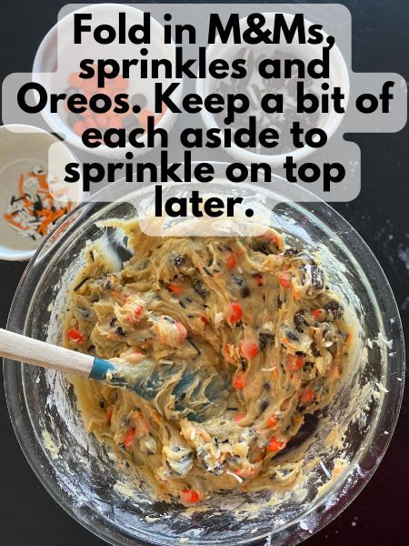 M&Ms, sprinkles and Oreos folded into blondie batter