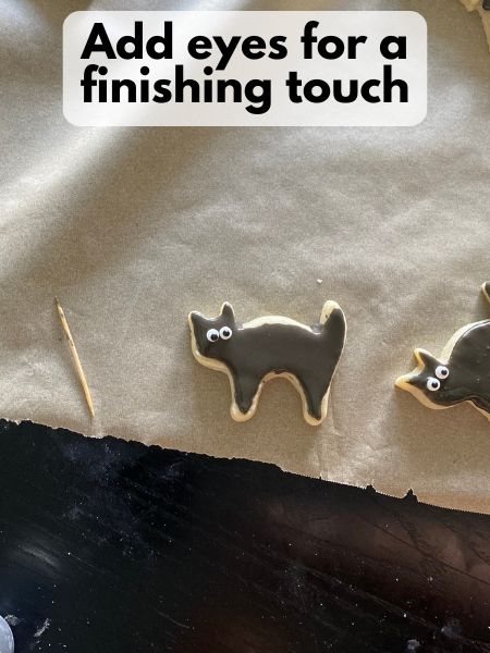 eyes added to iced cat cookies