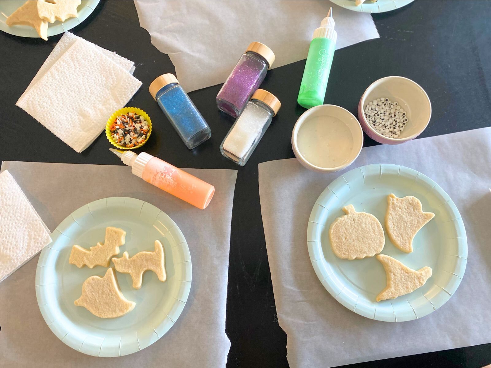 a table prepared for a cookie decorating party