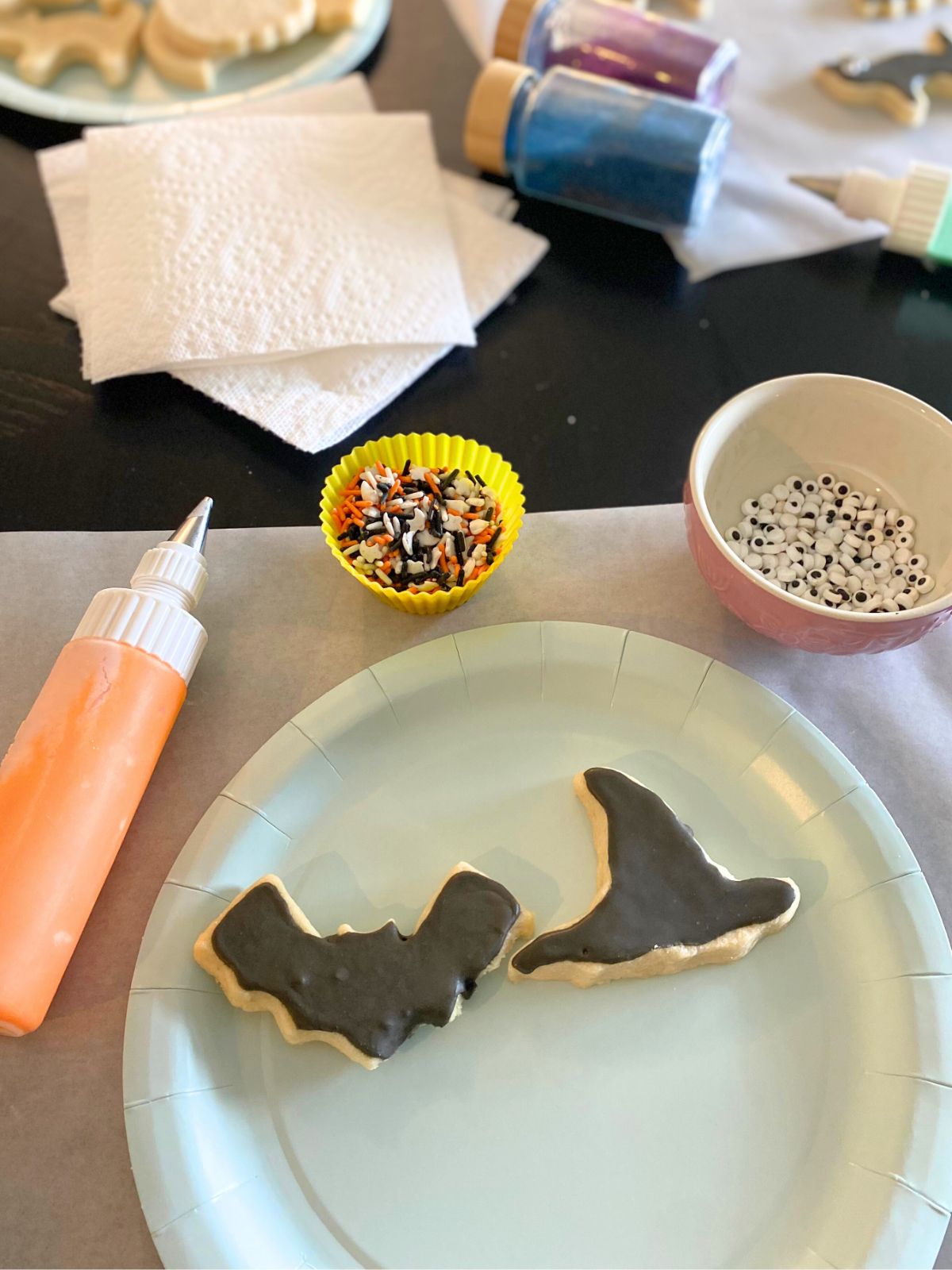 cookie decorating stations on a table