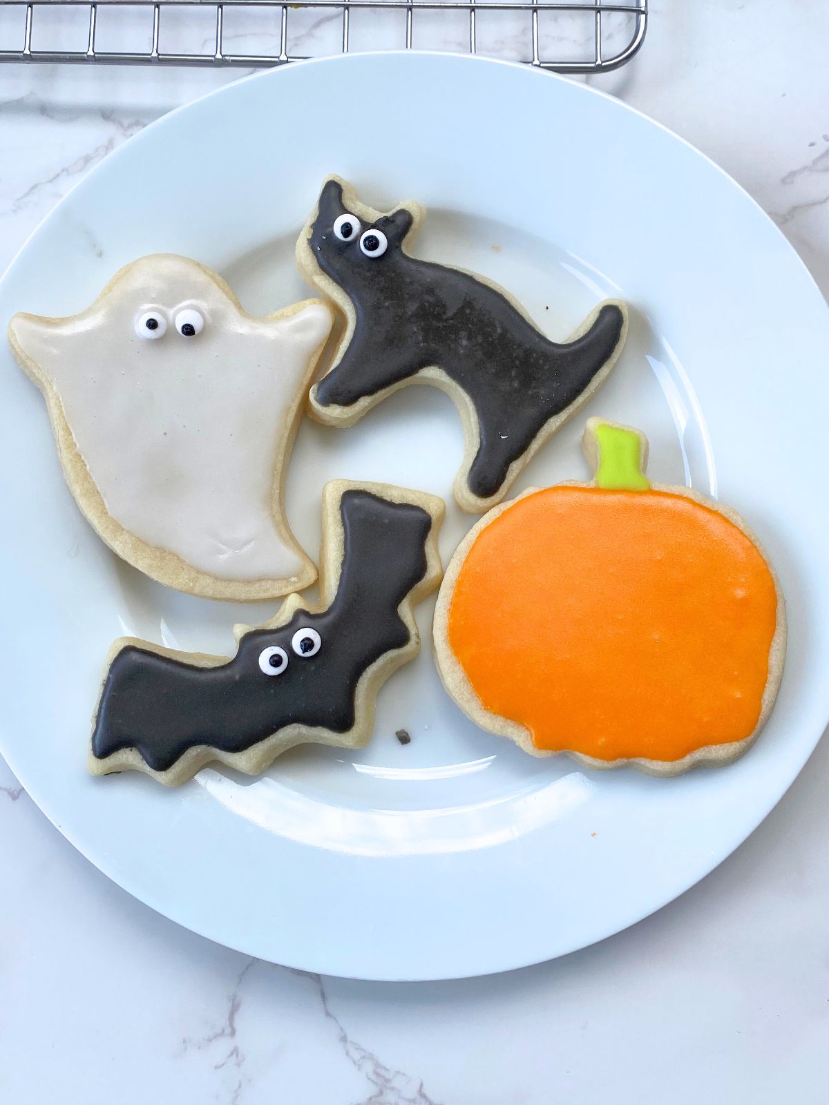 tray with some decorated cookies on it