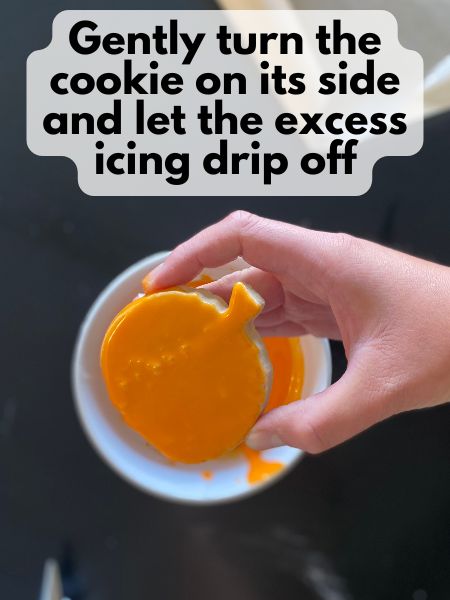 iced pumpkin on its side so excessing icing drips off