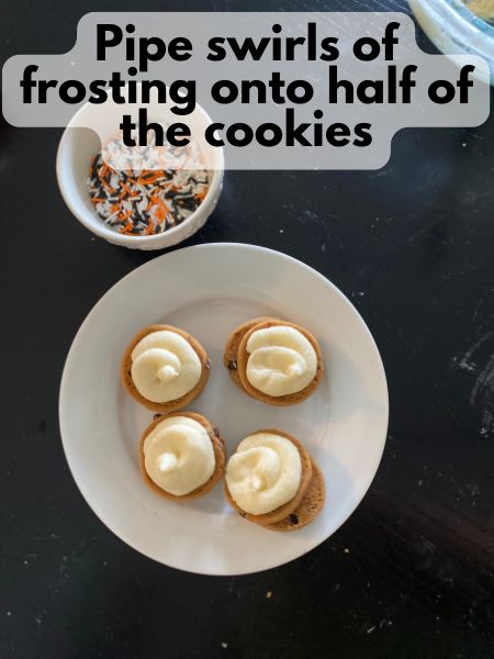 buttercream piped onto cookies