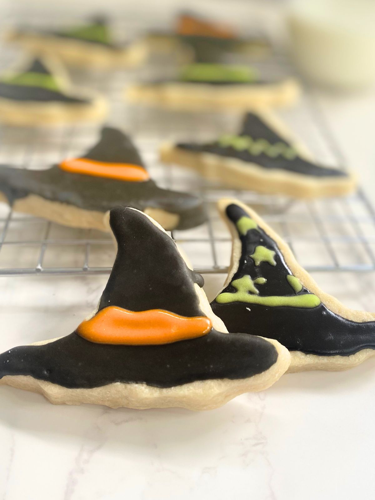 sugar cookies decorated like witch's hats