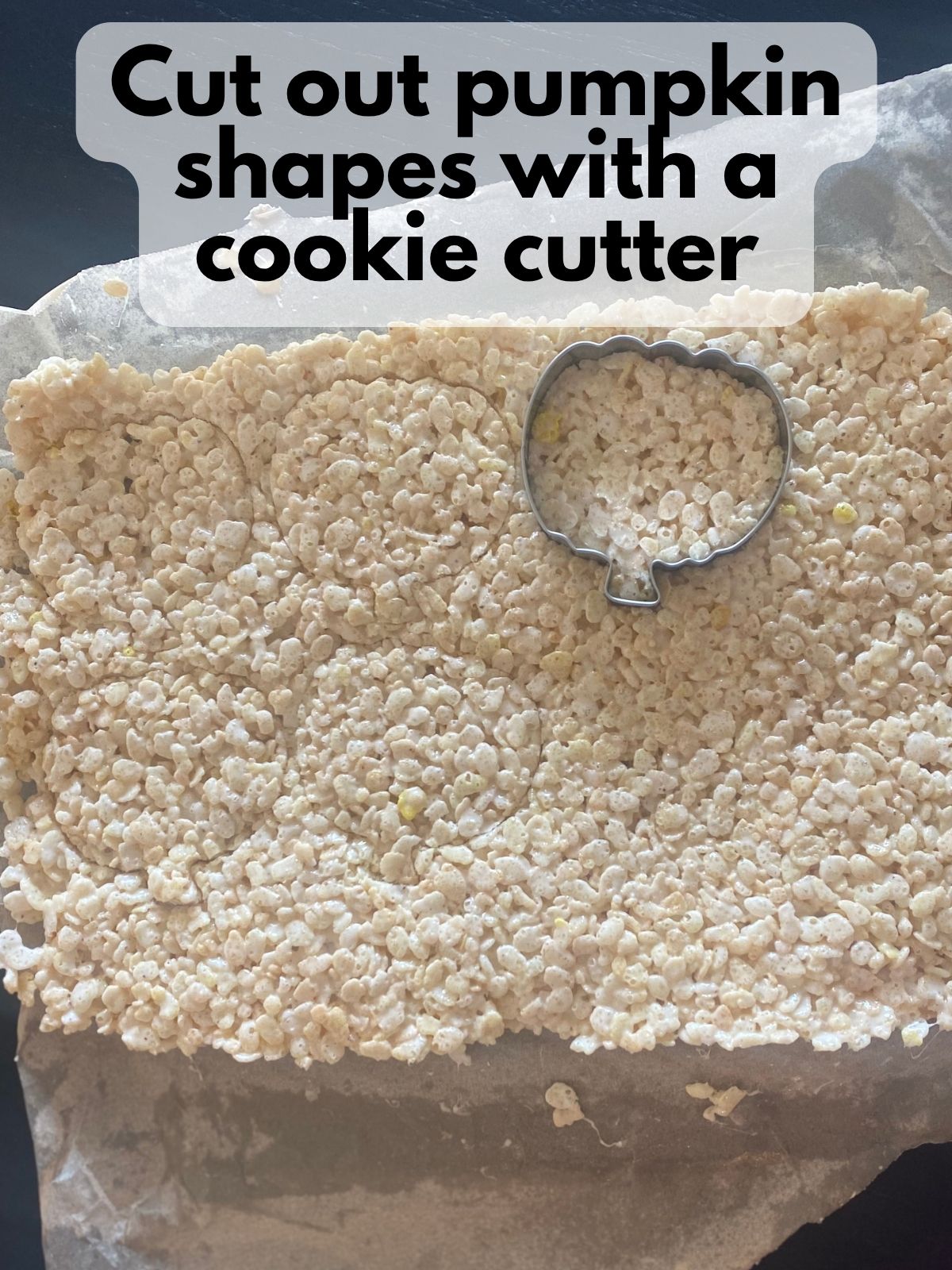 pumpkin cookie cutter cutting pumpkins out of rice krispie treats