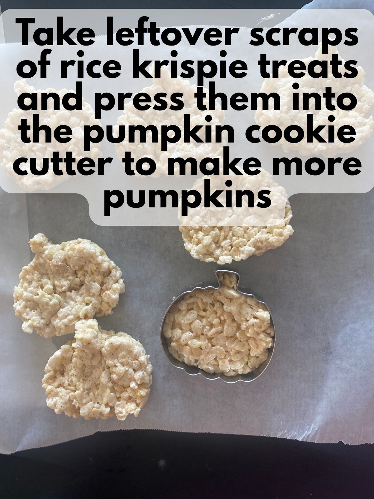 rice krispie treats scraps pressed into a pumpkin cookie cutter to make a pumpkin-shaped rice krispie treat