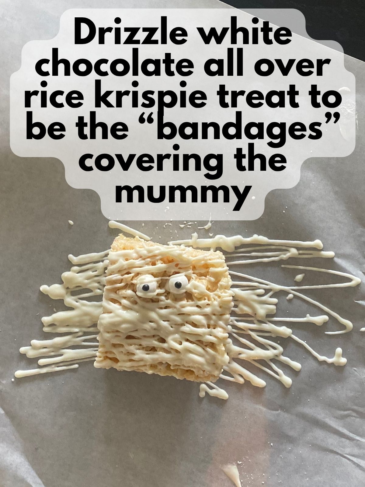white chocolate drizzled over mummy rice krispie treat
