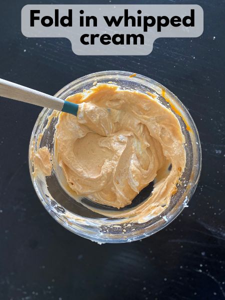 whipped topping folded into pumpkin cheesecake filling