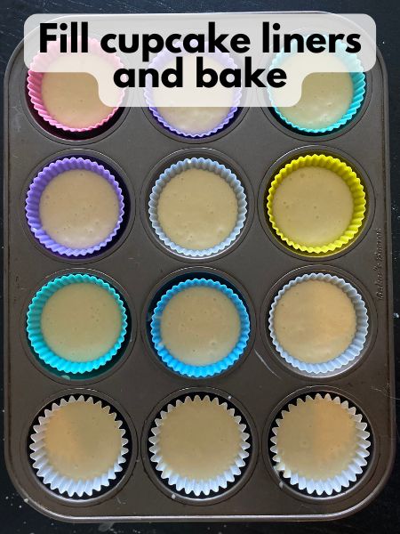 tres leches cupcake batter in lined muffin tin