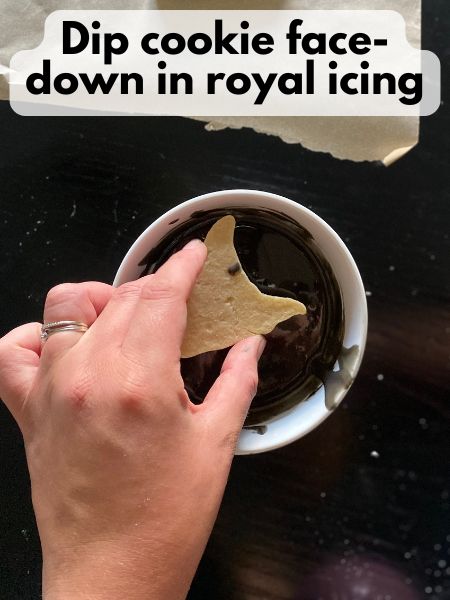 dip cookie face-down in icing