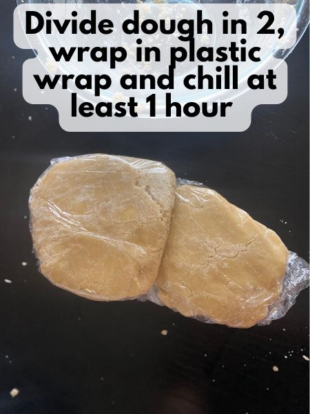 sugar cookie dough wrapped in plastic to chill