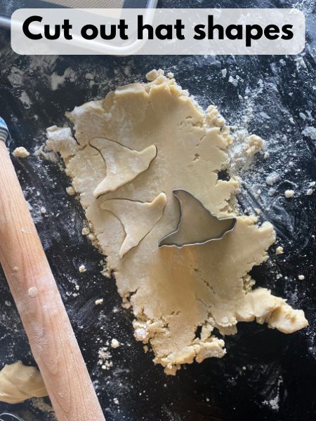 cut hat shapes out of sugar cookie dough