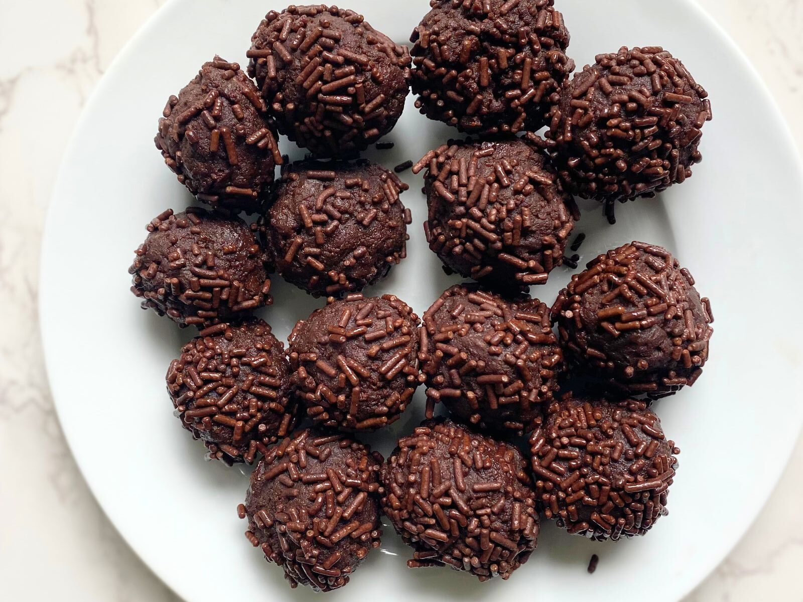 leftover brownie truffles on a plate