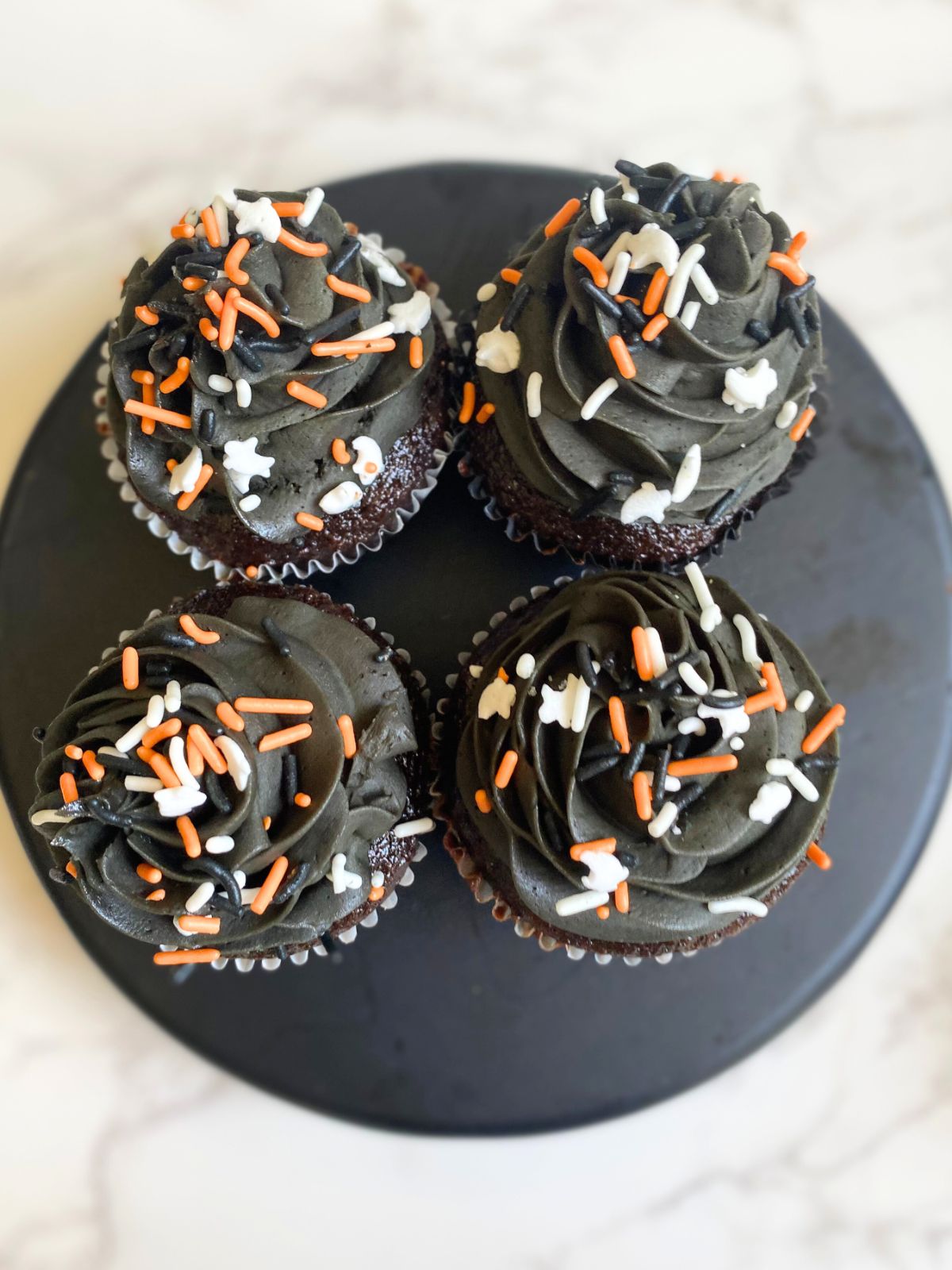 black frosted halloween cupcakes