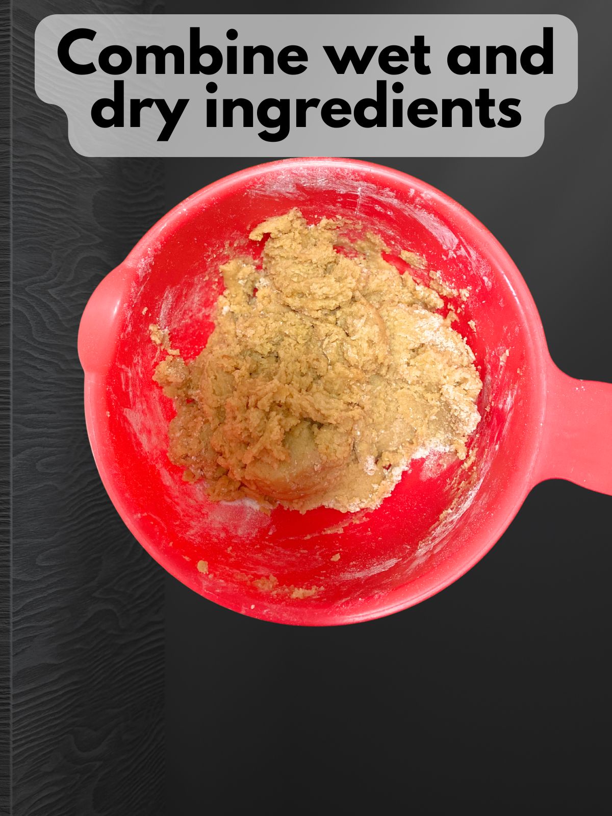 dry ingredients combeindcombined with wet ingredients in a mixing bowl