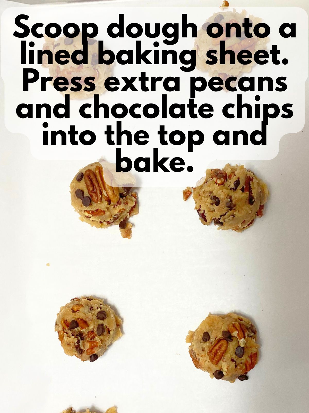 browned butter chocolate chip pecan cookies on a baking sheet