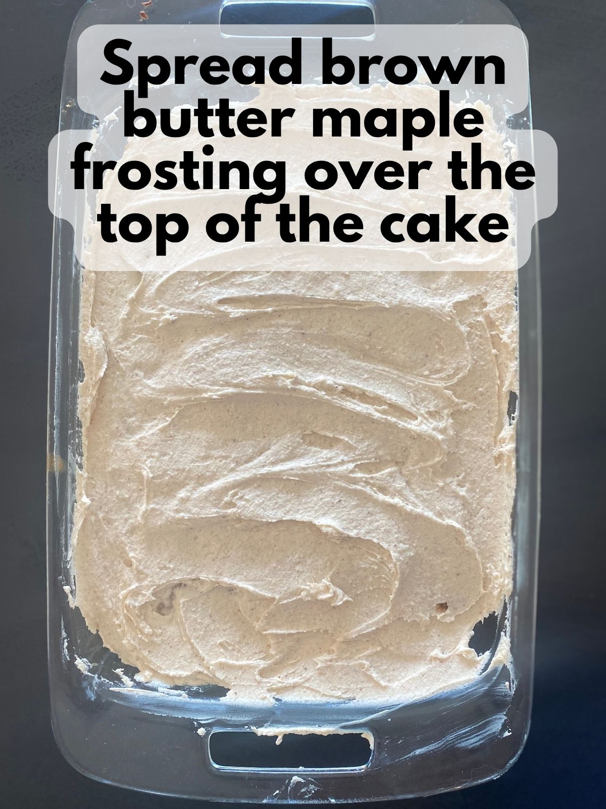 pumpkin poke cake with browned butter maple frosting on top