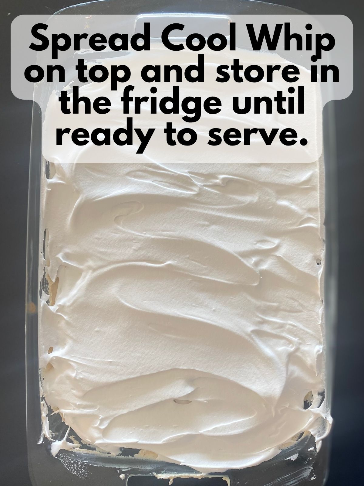 cake with cool whip spread on top of everything