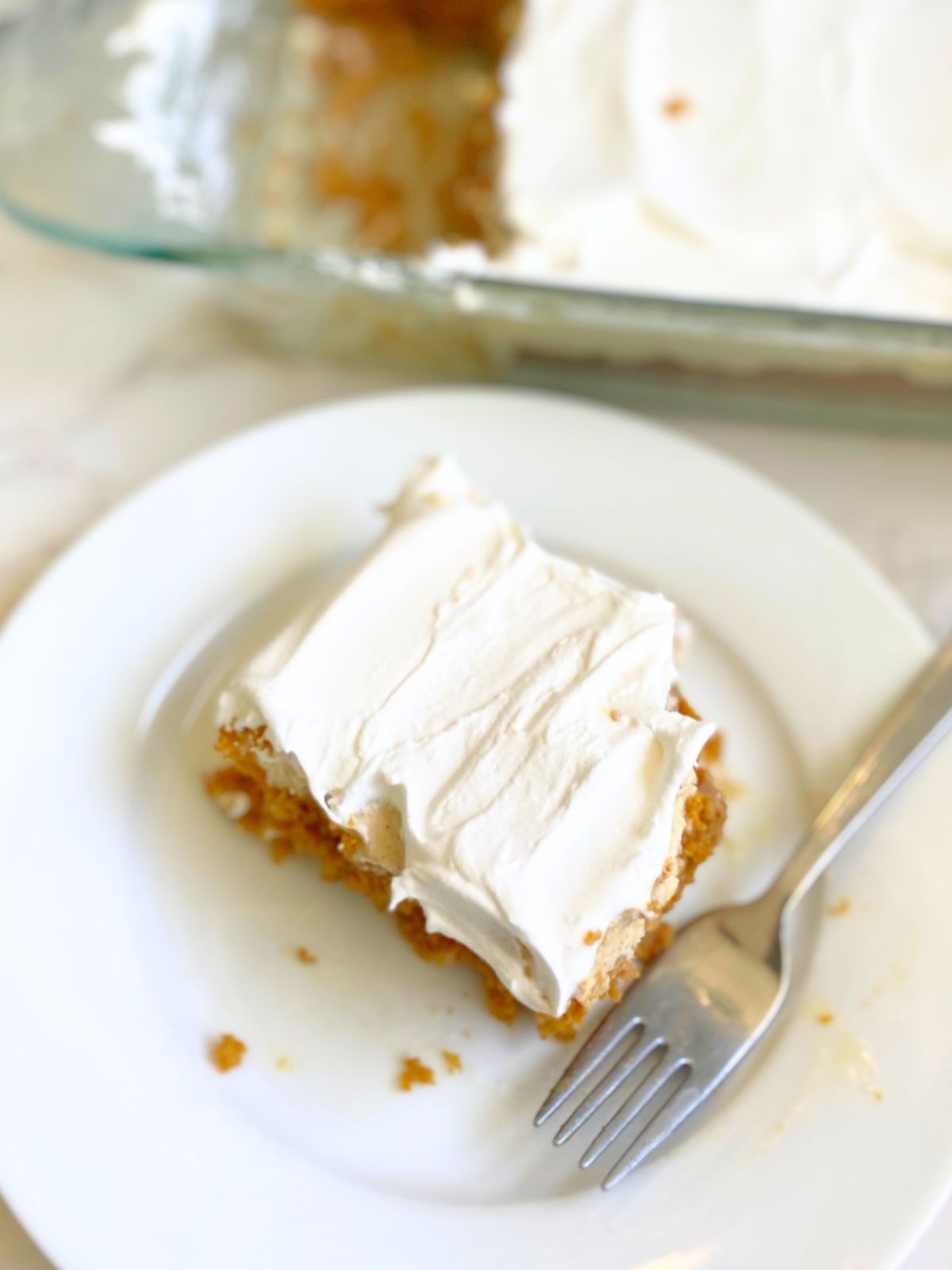 pumpkin poke cake with brown butter maple frosting